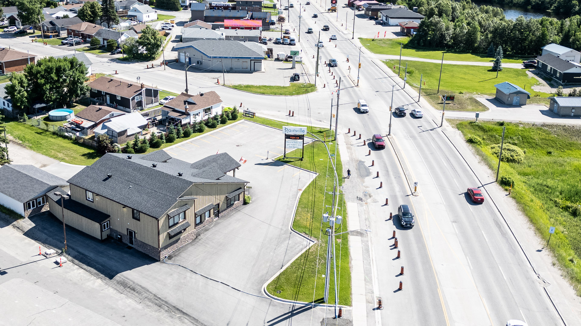 High aerial view of the Riverside Drive corridor surrounding the property